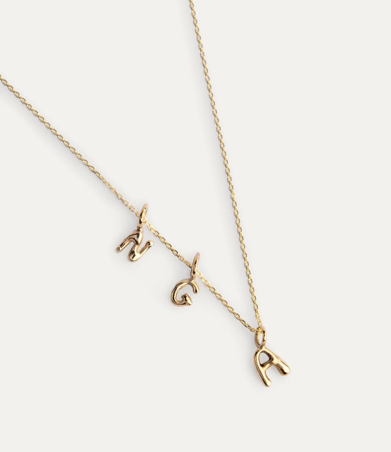 Studio zard charming letters necklace gold 