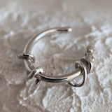 Silver ear cuffs