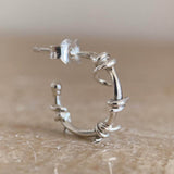 Silver ear cuffs